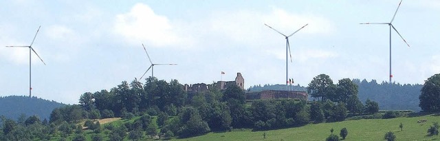 Wird die Hochburg optisch abgewertet? Windkraftgegner sagen Ja.   | Foto: Fotomontage: IG Gegenwind
