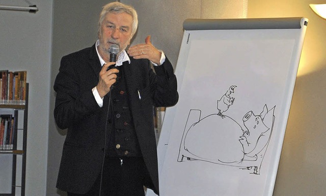 Peter Gaymann erklrt seine Cartoons.   | Foto: robert ullmann