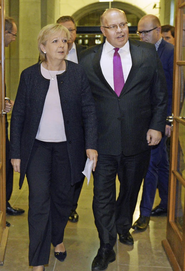 Hannelore Kraft (links) und Peter Altmaier  | Foto: dpa