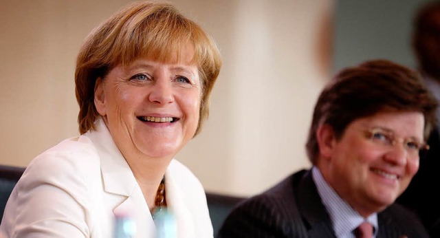 Regierungschefin Angela Merkel und ihr...art von Klaeden, im Juli dieses Jahres  | Foto: dpa
