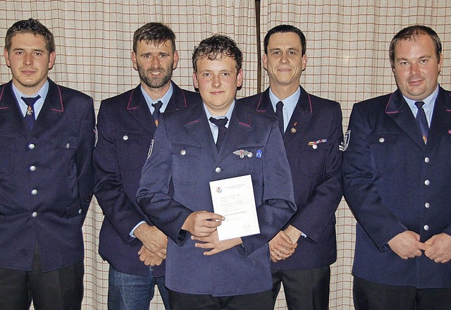 Benno Wunderle mit Gesamtkommandant Ch...ertreter Michael Brender (von rechts).  | Foto: Ulrike Jger