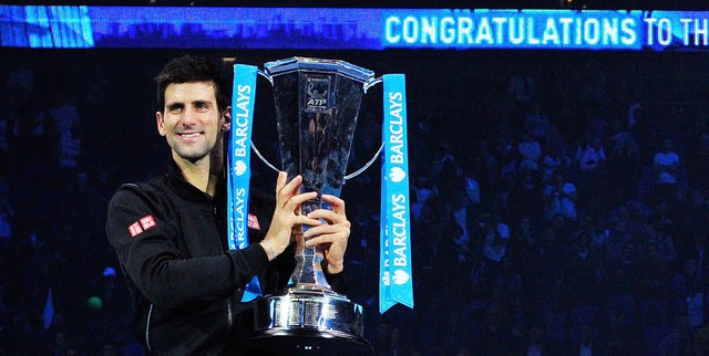 Gratulation: Das Tennisjahr nimmt fr ...dem Sieg in London das erhoffte Ende.   | Foto: afp