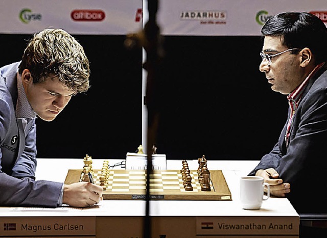 Magnus Carlsen (links), Viswanathan Anand   | Foto: AFP