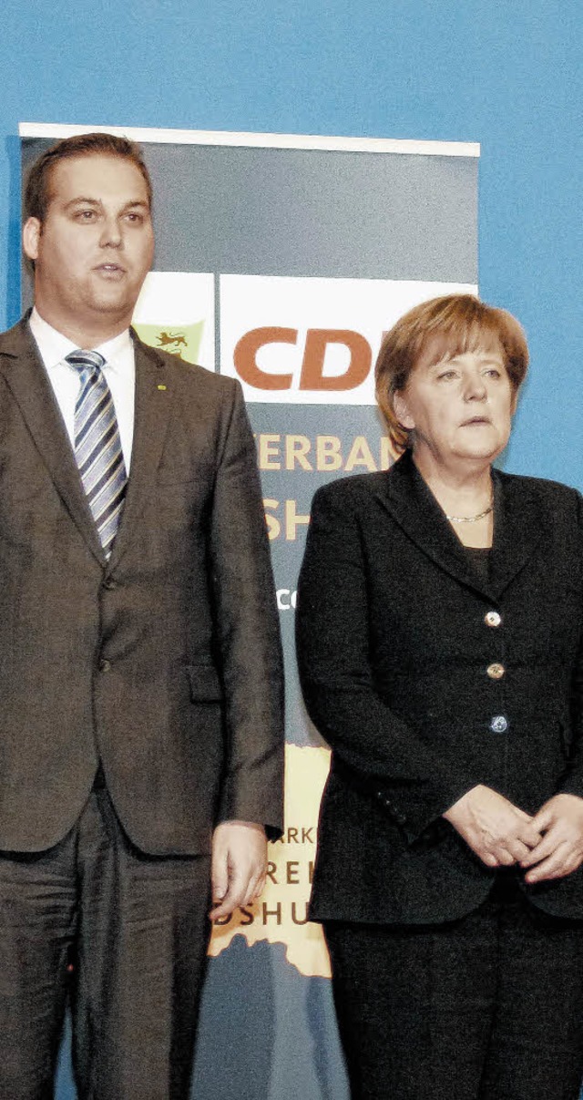 Angela Merkel mit dem Kreisvorsitzende...chreiner  beim Landtagswahlkampf 2011   | Foto: Herbst