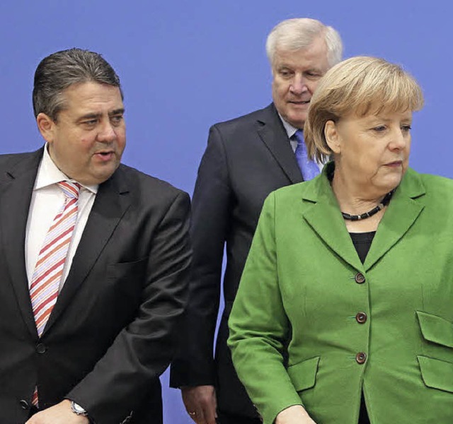 Wollen gemeinsam regieren: Sigmar Gabr...ehofer (CSU) und Angela Merkel (CDU).   | Foto: DPA