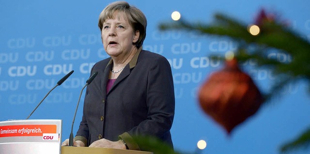 Es ist dritter Advent und Deutschland ...erung, besttigt von Kanzlerin Merkel.  | Foto: dpa