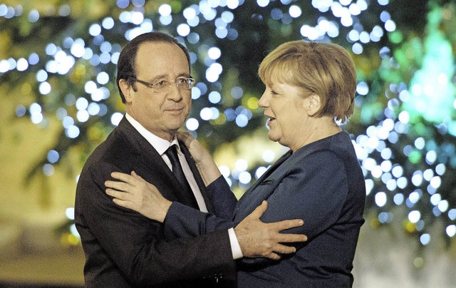 Demonstrative Einigkeit in vorweihnach...: Franois Hollande und Angela Merkel   | Foto: afp