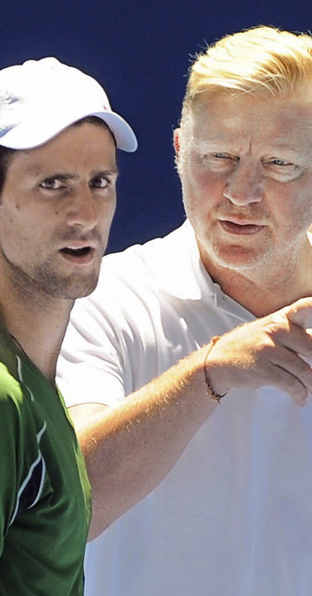 Boris Becker (rechts) und  Novak Djokovic.  | Foto: dpa