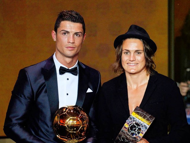 Selten gemeinsam zu sehen: Cristiano Ronaldo und Nadine Angerer  | Foto: dpa