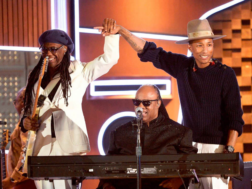 Nile Rodgers (links) mit Stevie Wonder und Pharrell Williams