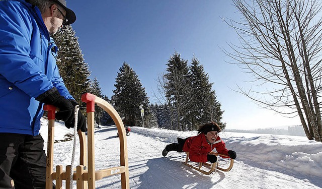 Mit Karacho den Berg hinab: Rodeln im Hochschwarzwald macht sichtlich Spa.  | Foto: HTG