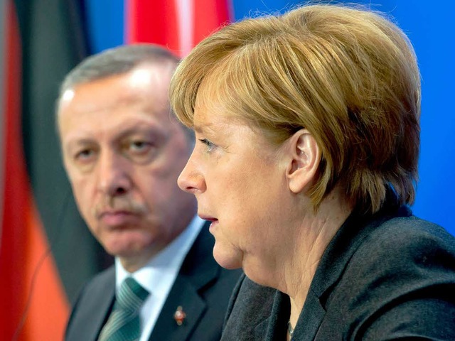 Der trkische Premier Erdogan und Angela Merkel   | Foto: DPA