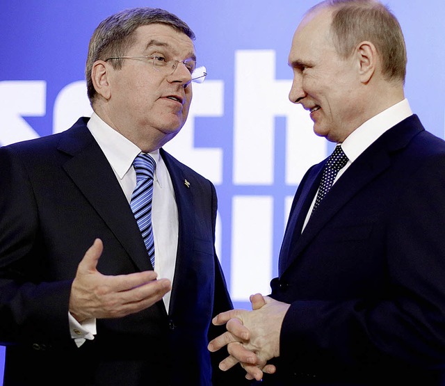 Freunde unter sich: IOC-Chef Thomas Ba...ds Prsident Wladimir Putin in Sotschi  | Foto: afp