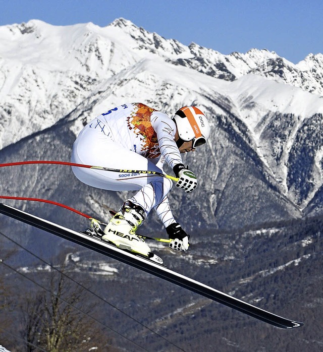 Bode Miller vor dem Start, bei der Sch...hrt und whrend einer Pressekonferenz.  | Foto: afp