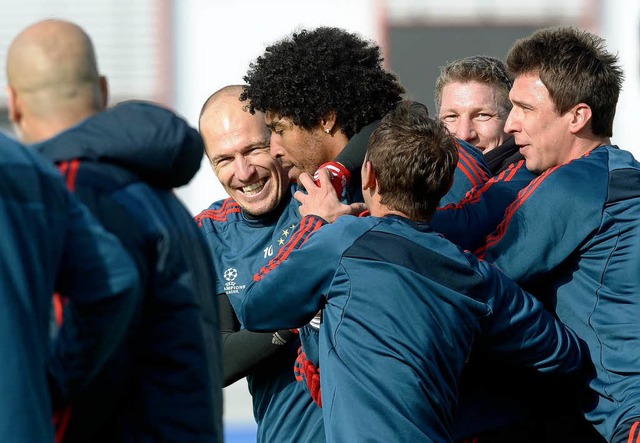 Gute Laune im Bayern-Training.   | Foto: dpa