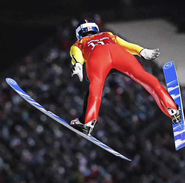 Anflug zur Goldmedaille: Skispringer Andreas Wank  | Foto: dpa