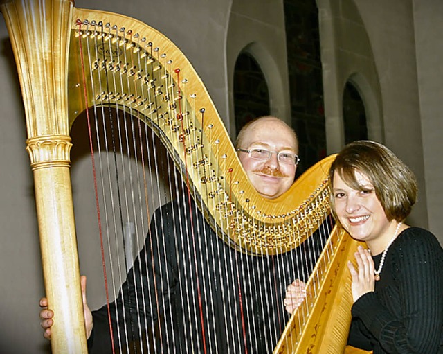 Zwei vom Quartett Saitenschlag: Yvonne Deusch und Michael Deusch   | Foto: zvg