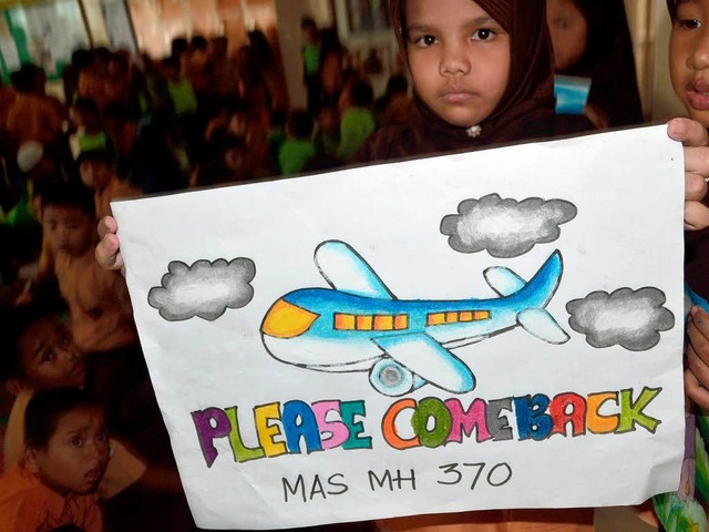 Ein Flugzeug der Malaysia Airlines ist nach wie vor verschwunden.  | Foto: AFP