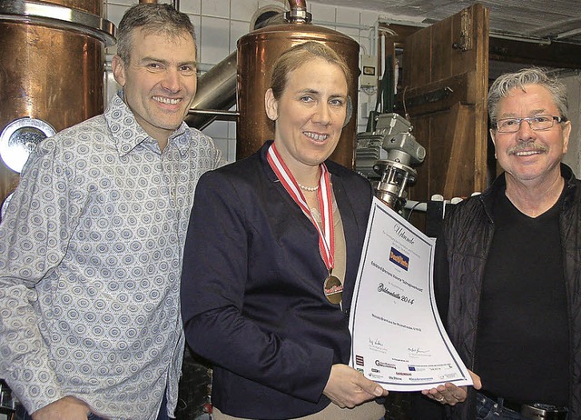 Glckliche Goldmedaillengewinner: Ferd...erei ber ihren erfolgreichen Moscato.  | Foto: Jutta Binner-Schwarz