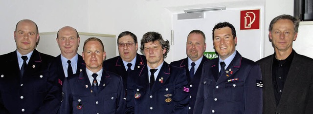 Adrian Schpflin, Roland Beuschel, And...ks) fr ihren  Feuerwehrdienst geehrt.  | Foto: Mink