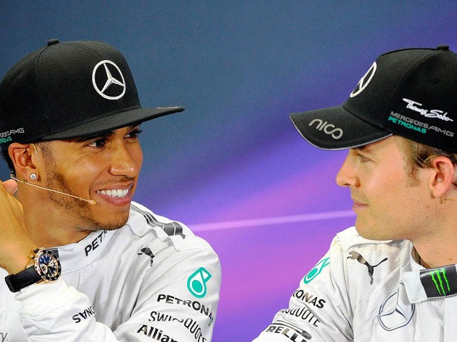 Freunde, Teamkollegen und doch zugleic...is Hamilton (links) und Nico Rosberg    | Foto: DPA