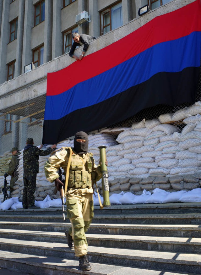 Prorusssische Bewaffnete in Slawjansk.   | Foto: AFP