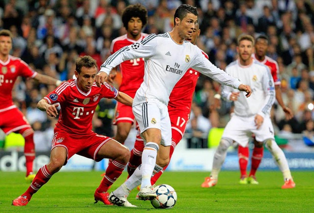 Einer gegen alle: Cristiano Ronaldo (a...ie Real-Angriffe  mit Toren veredeln.   | Foto: dpa