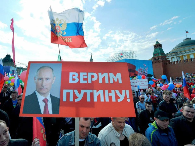 Demonstrant in Moskau: &#8222;Wir glauben Putin!&#8220;   | Foto: AFP