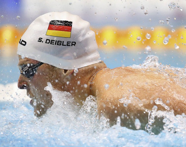 Steffen Deibler bei seinem Sieg ber 100 Meter Schmetterling    | Foto: dpa
