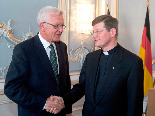 Kretschmann und Burger   | Foto: dpa