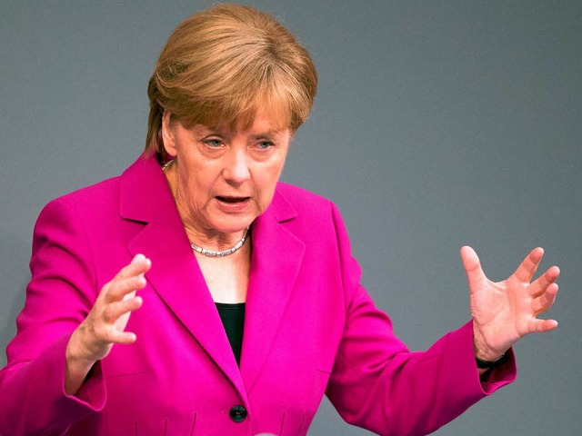 Vollauf zufrieden mit der Arbeit der  Koalition: Kanzlerin Merkel   | Foto: dpa