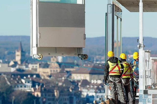 Lohndumping beim Bau des Roche-Turms durch deutsche Firma