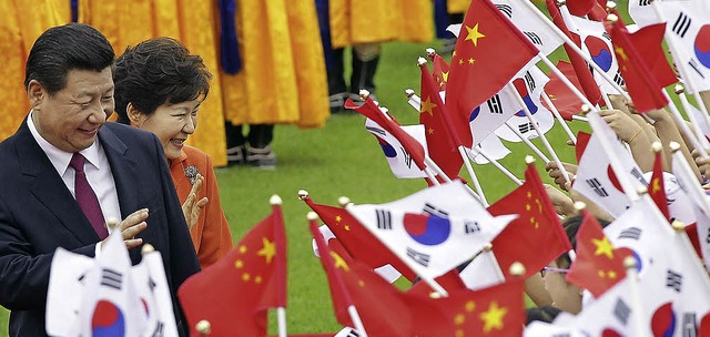 Chinas Prsident  Xi Jinping  und sein...eanische Amtskollegin   Park Geun Hye   | Foto: DPA