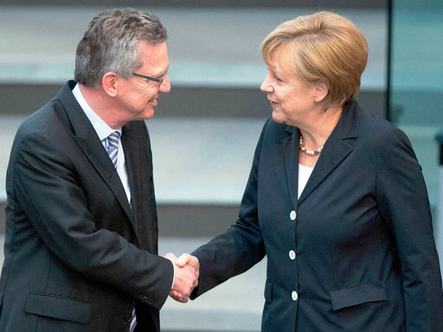 Die Unionsfraktion im Bundestag hat de...estlohn mit groer Mehrheit gebilligt.  | Foto: dpa