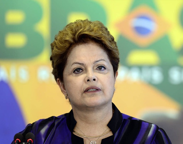 Erhofft sich von der WM Rckenwind fr... Brasiliens Prsidentin Dilma Rousseff  | Foto: AFP