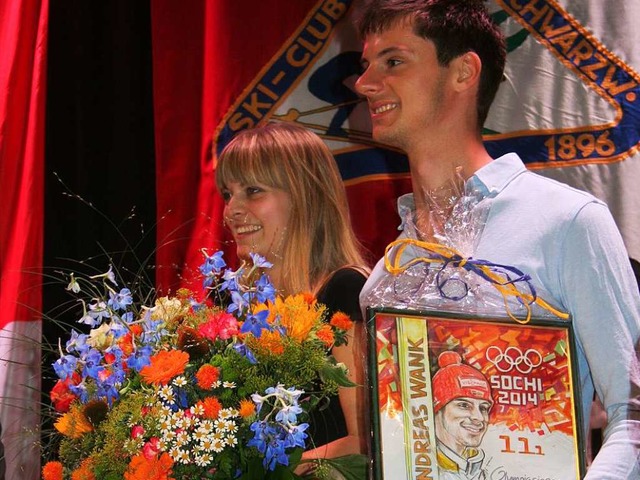 Der Olympiasieger und seine Partnerin bei der Ehrung im Kurhaus.   | Foto: Dieter Maurer
