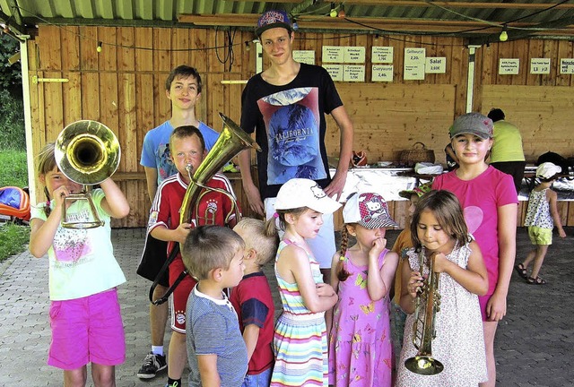 Mit viel Spa dabei waren die Kinder b...chwier und Christian Gtz (von links).  | Foto: Reiner Merz