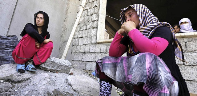 Jesidische Frauen sind vor der Gewalt ...die kurdische Stadt Dohuk geflchtet.   | Foto: AFP