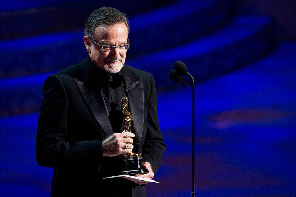 2010: Robin Williams berreicht einen Oscar bei den 82.  Academy Awards.