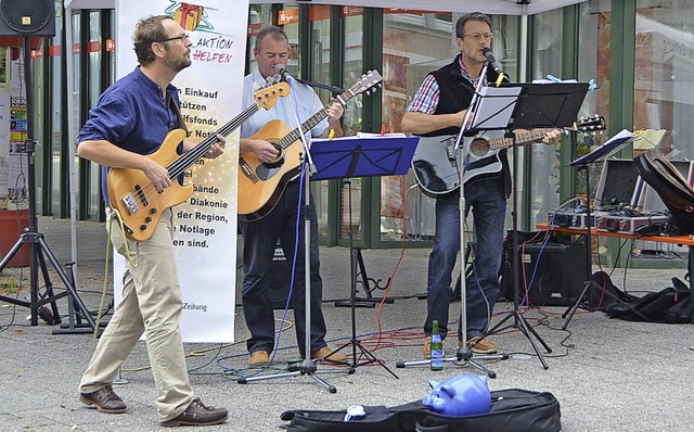 Martin Riegraf, Andreas Harder und Tho...h fr die Spendensau die Finger wund.   | Foto: Martin Herceg