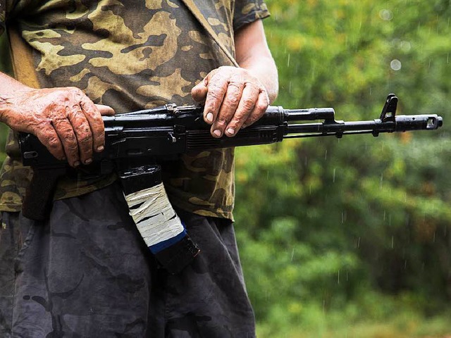 Es wird immer offensichtlicher, dass r...he Soldaten in der Ostukraine kmpfen.  | Foto: AFP