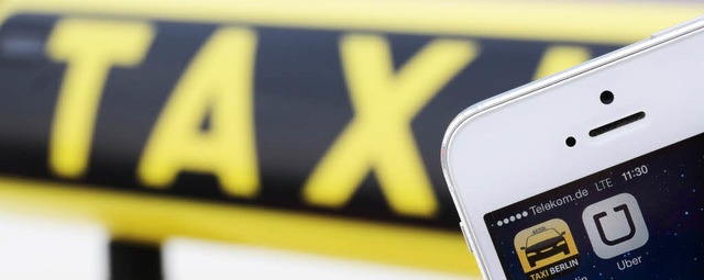 Stt den Taxifahrern bel auf: die App des Fahrdienstes Uber.   | Foto: DPA