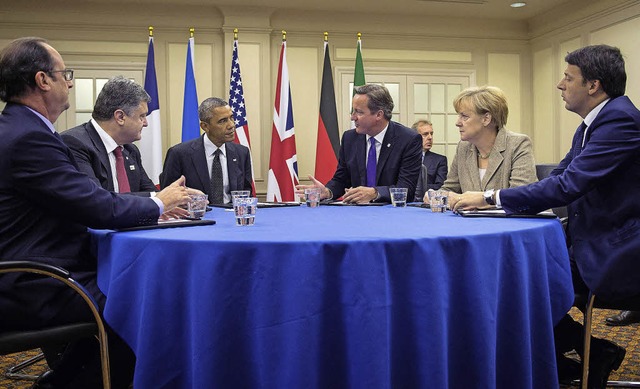 Staats- und Regierungschefs beraten au...schland) und  Matteo Renzi (Italien).   | Foto: dpa