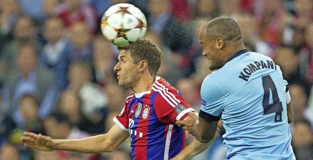 Reine Kopfsache? Bayern-Spieler Thomas...sters Innenverteidiger Vincent Kompany  | Foto: dpa