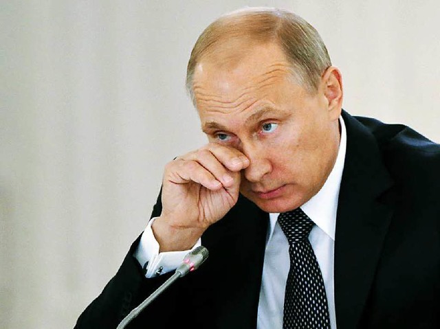 Russlands Prsident Wladimir Putin lsstsich nicht in die Karten schauen.  | Foto: AFP