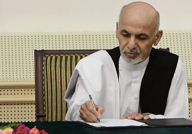 Afghanistans neuer Prsident Ghani unt...n zur knftigen Aufteilung der Macht.   | Foto: AFP