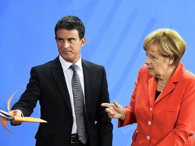 Manuel Valls und Angela Merkel  in Berlin   | Foto: afp