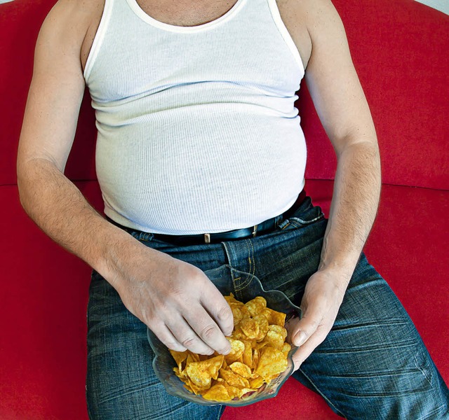 Akut gesundheitsgefhrdend: Chips im Sitzen   | Foto: D.Ott(Fotolia)/dpa