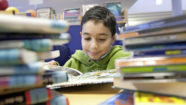 Lesen macht Kindern Spa, zumindest so...ss ist, ergab die Umfrage der Kinder.   | Foto: dpa