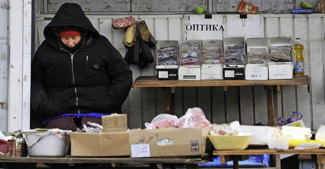 In der Ukraine steht der Winter bevor ...leich auf der Flucht im eigenen Land.   | Foto: AFP